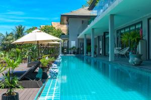 สระว่ายน้ำที่อยู่ใกล้ ๆ หรือใน Villa Samayra - Super Luxury Villa Koh Samui