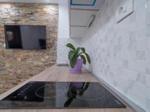 TV a/nebo společenská místnost v ubytování Casa di Fratelli