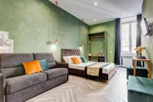 A seating area at Ripetta Natural Suites