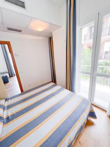 Кровать или кровати в номере Residence Paradiso