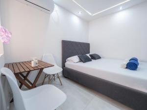 Postel nebo postele na pokoji v ubytování Casa di Fratelli