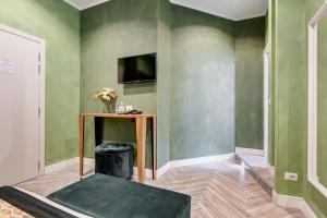 A bed or beds in a room at Ripetta Natural Suites