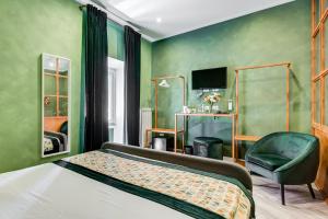 A bed or beds in a room at Ripetta Natural Suites