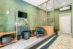 A seating area at Ripetta Natural Suites