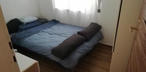 Postel nebo postele na pokoji v ubytování Little Zen House