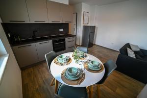 Kuchyň nebo kuchyňský kout v ubytování Apartment Perlitto