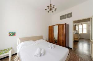 Кровать или кровати в номере ALTIDO Family Flat in Sestri Levante Centre
