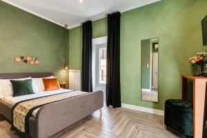 A bed or beds in a room at Ripetta Natural Suites