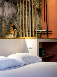 Un ou plusieurs lits dans un hébergement de l'établissement Altera Roma Hôtel