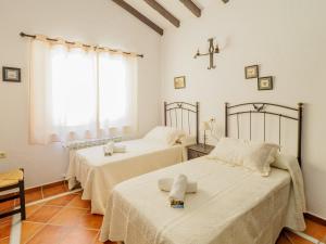 Postel nebo postele na pokoji v ubytování Tu Villa Rural Lentisco 8 Dormitorios Piscina privada