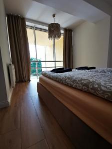 Postel nebo postele na pokoji v ubytování Good Space Palanga