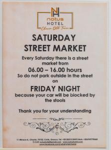 a poster for aaturday street market with a sign at Notus Chania Crete in Chania Town