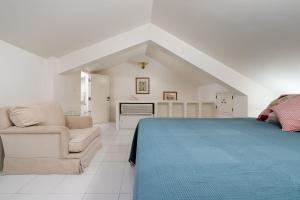 En eller flere senge i et værelse på Marina Views