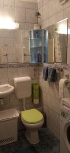 Ванная комната в BranySol Apartman