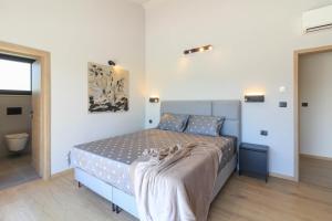 Postel nebo postele na pokoji v ubytování Modern villa with private pool in Pula
