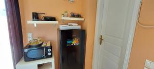Kuchyňa alebo kuchynka v ubytovaní Anastacias Apartment