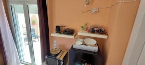 Televízia a/alebo spoločenská miestnosť v ubytovaní Anastacias Apartment