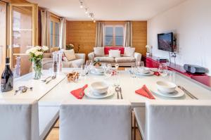 TV a/nebo společenská místnost v ubytování Chalet Bergrose 4