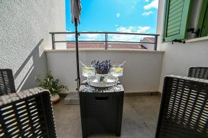 Balkón nebo terasa v ubytování Apartment Perlitto