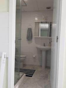 Kúpeľňa v ubytovaní Apartamento bella vista + 16 fotografií