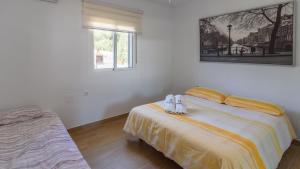 Posteľ alebo postele v izbe v ubytovaní Villa Isabel Malaga - Churriana by Ruralidays + 23 fotografií