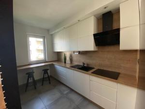 Kuchnia lub aneks kuchenny w obiekcie Apartament Miłosz