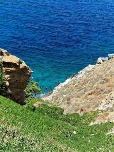 a view of the blue ocean from a cliff at Panorama of seladi in Kastron