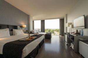 Posteľ alebo postele v izbe v ubytovaní Eurostars Palace
