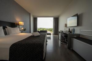 Posteľ alebo postele v izbe v ubytovaní Eurostars Palace