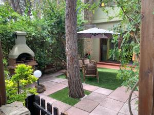 Vonkajšia záhrada v ubytovaní Casa Bouganville Pinus Village