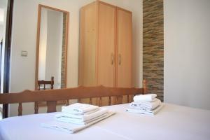 Postel nebo postele na pokoji v ubytování Apartments Aga