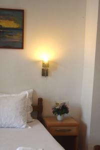 Postel nebo postele na pokoji v ubytování Apartments Aga
