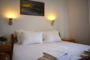 Postel nebo postele na pokoji v ubytování Apartments Aga