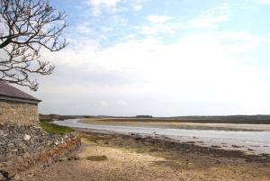 ชายหาดของบ้านพักตากอากาศหรือชายหาดที่อยู่ใกล้ ๆ