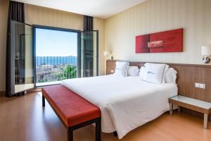 Postel nebo postele na pokoji v ubytování Hotel Ibersol Atrio del Mar