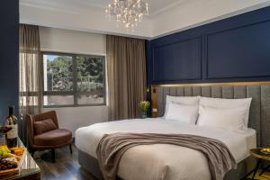 Letto o letti in una camera di The David Story Boutique