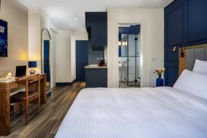 Letto o letti in una camera di The David Story Boutique