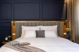 Letto o letti in una camera di The David Story Boutique