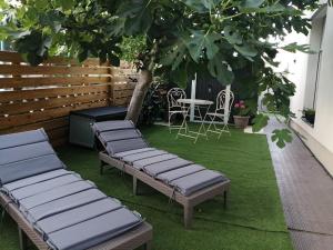 Zahrada ubytování Holiday Home Slavica, prizemlje objekta
