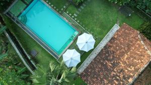 A view of the pool at Blue Garden Yogyakarta or nearby