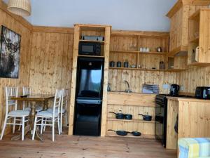 A kitchen or kitchenette at Dulrush Fishing Lodge and Guest House