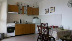 Kuchyň nebo kuchyňský kout v ubytování Apartment Z&E