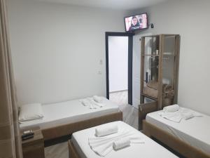 Postel nebo postele na pokoji v ubytování ELMA Guest House