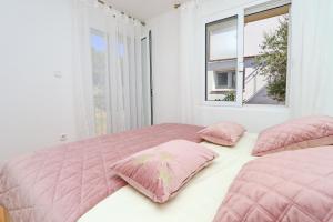 En eller flere senge i et værelse på Villa Green Bay + 122 billeder