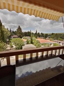 a view of a garden from a balcony at Apartments Ivanković in Stari Grad