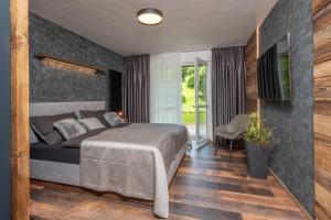 Ένα ή περισσότερα κρεβάτια σε δωμάτιο στο Apartmány La Pasta