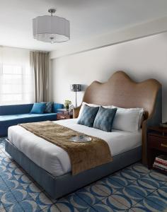A bed or beds in a room at Shelborne South Beach by Proper