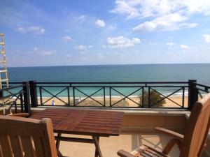 Sea View Rental Front Beach tesisinde bir balkon veya teras