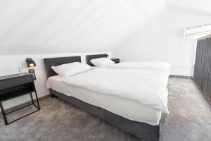 Ein Bett oder Betten in einem Zimmer der Unterkunft Domki na Łące