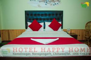 Hotel Happy Home客房内的一张或多张床位
